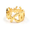 Anillo con símbolos dorado